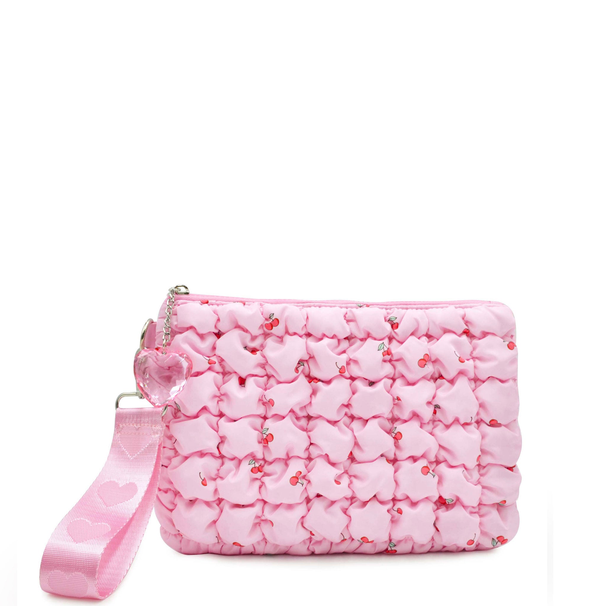 front view of a cherry printed pink quilted wristlet pouch with a heart wrist handle 