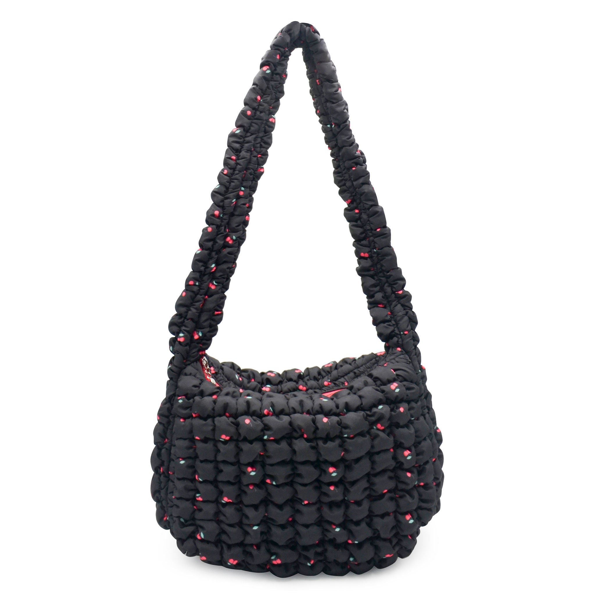 front view of a black colored cherry print quilted nylon hobo style crossbody sling bag