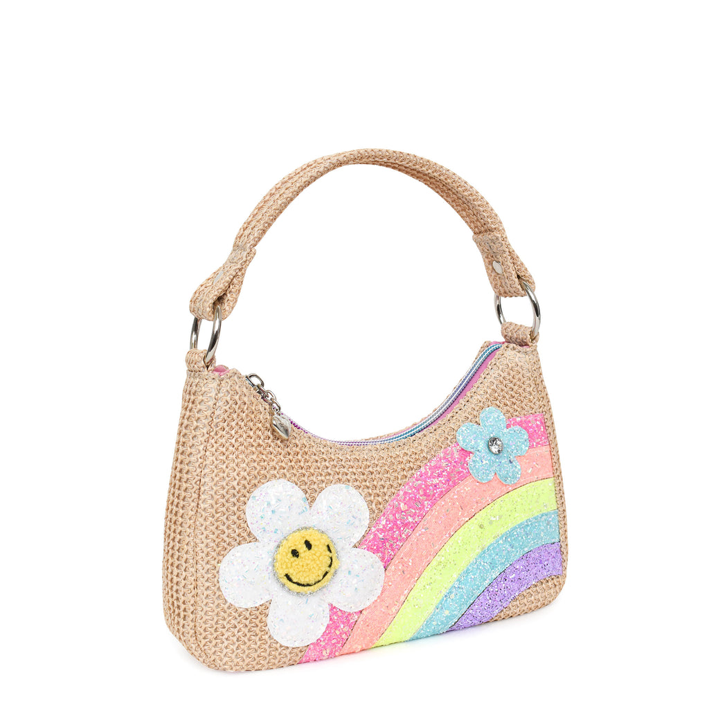 Side  view of straw mini hobo bag with glitter rainbow and daisy appliqués