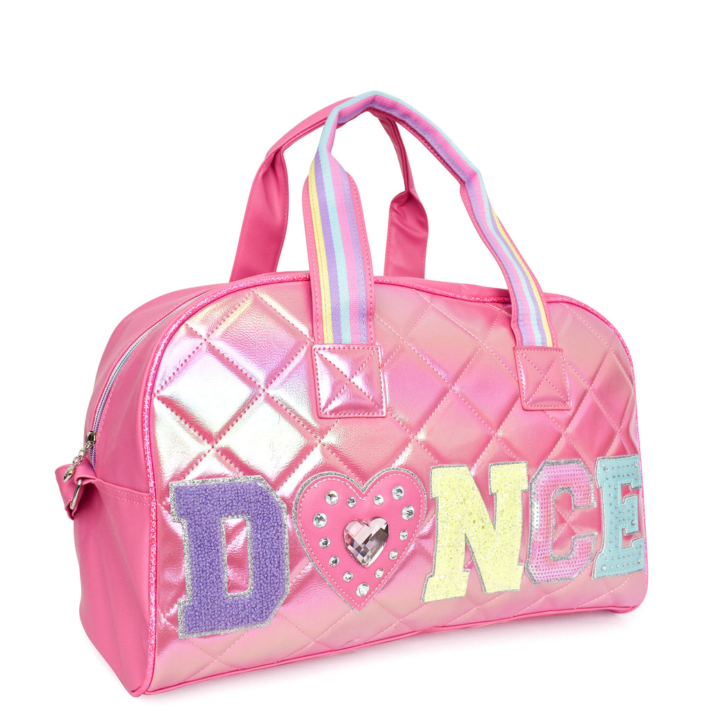 Side view of pink quilted metallic 'Dance' duffle with varsity-letter patches and a rhinestone heart patch