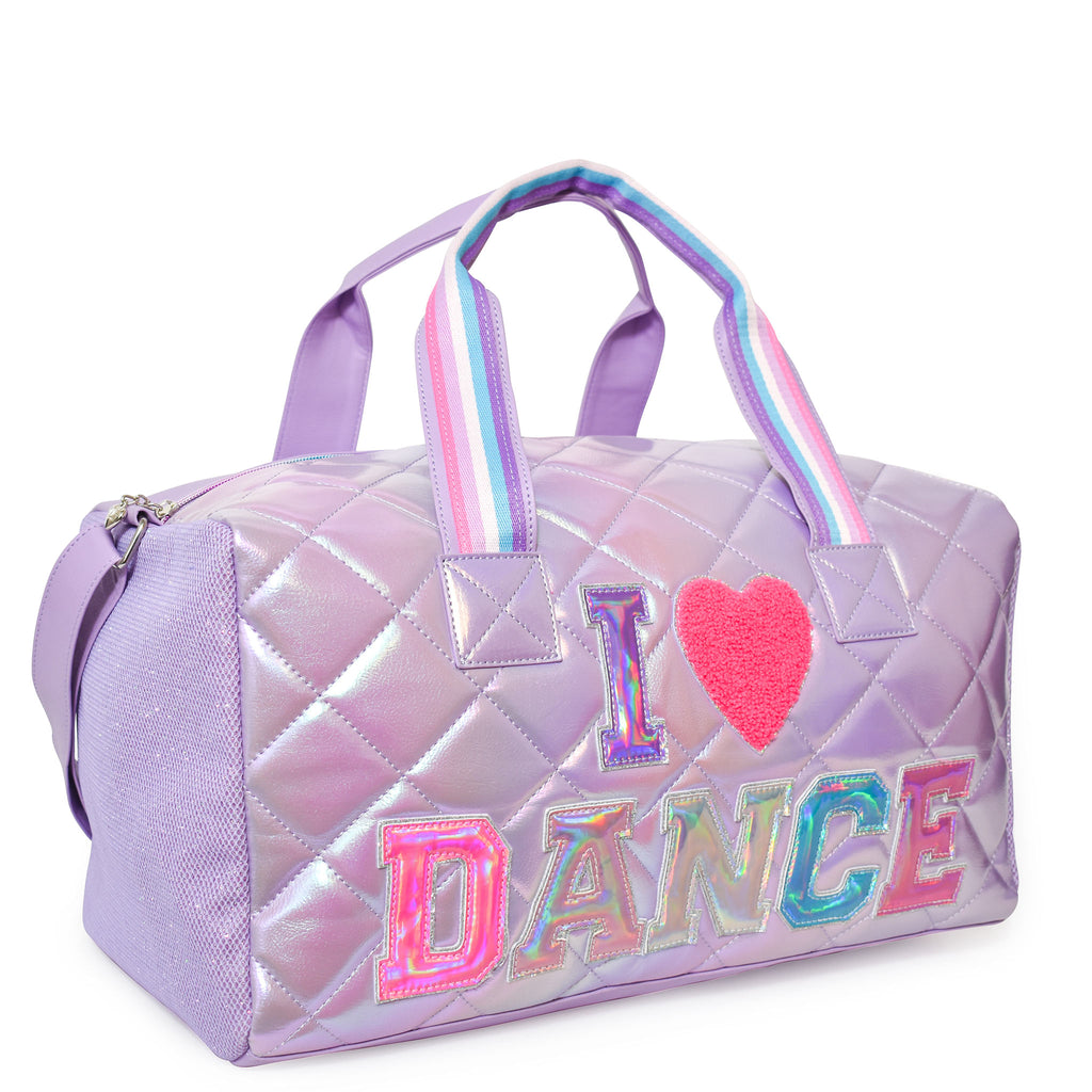 Side view of quilted metallic lavender large 'I Love Dance' duffle with reflective varsity-letter patches
