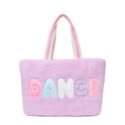 Front view of a purple sherpa large tote bag with glitter bubble letters 'DANCE ' applique