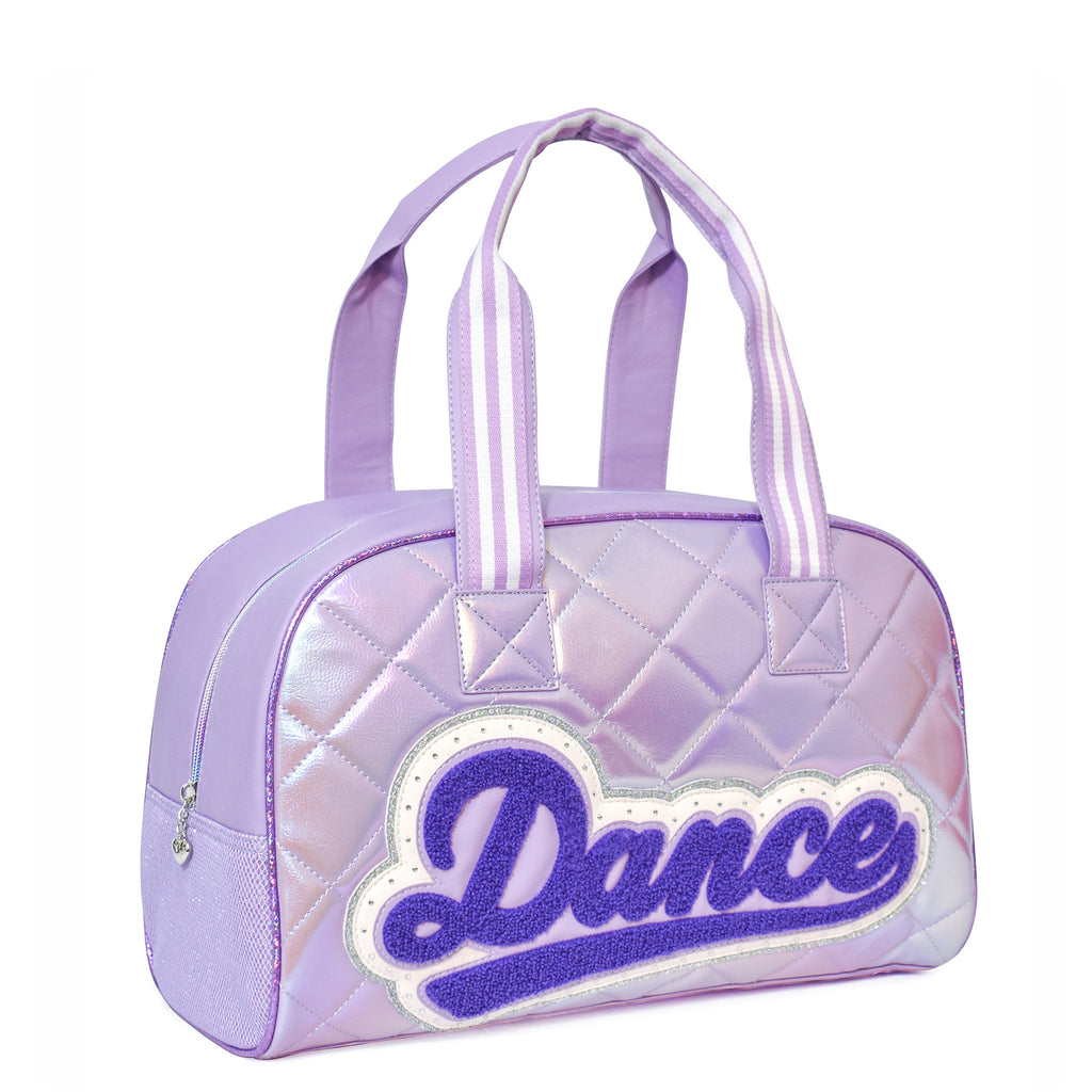 Side view of quilted metallic medium lavender duffle with retro-style 'Dance' patch