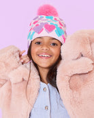 photoshoot photo of model wearing a heart-printed hat and gloves set