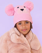 model wearing a teddy face hat and gloves set in a pink chenille 