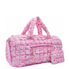 3/4 facing view of a pink large sized quilted scrunch nylon duffle bag with a floral print and front beaded zipper pocket with a crystal heart charm and matching detachable coin pouch
