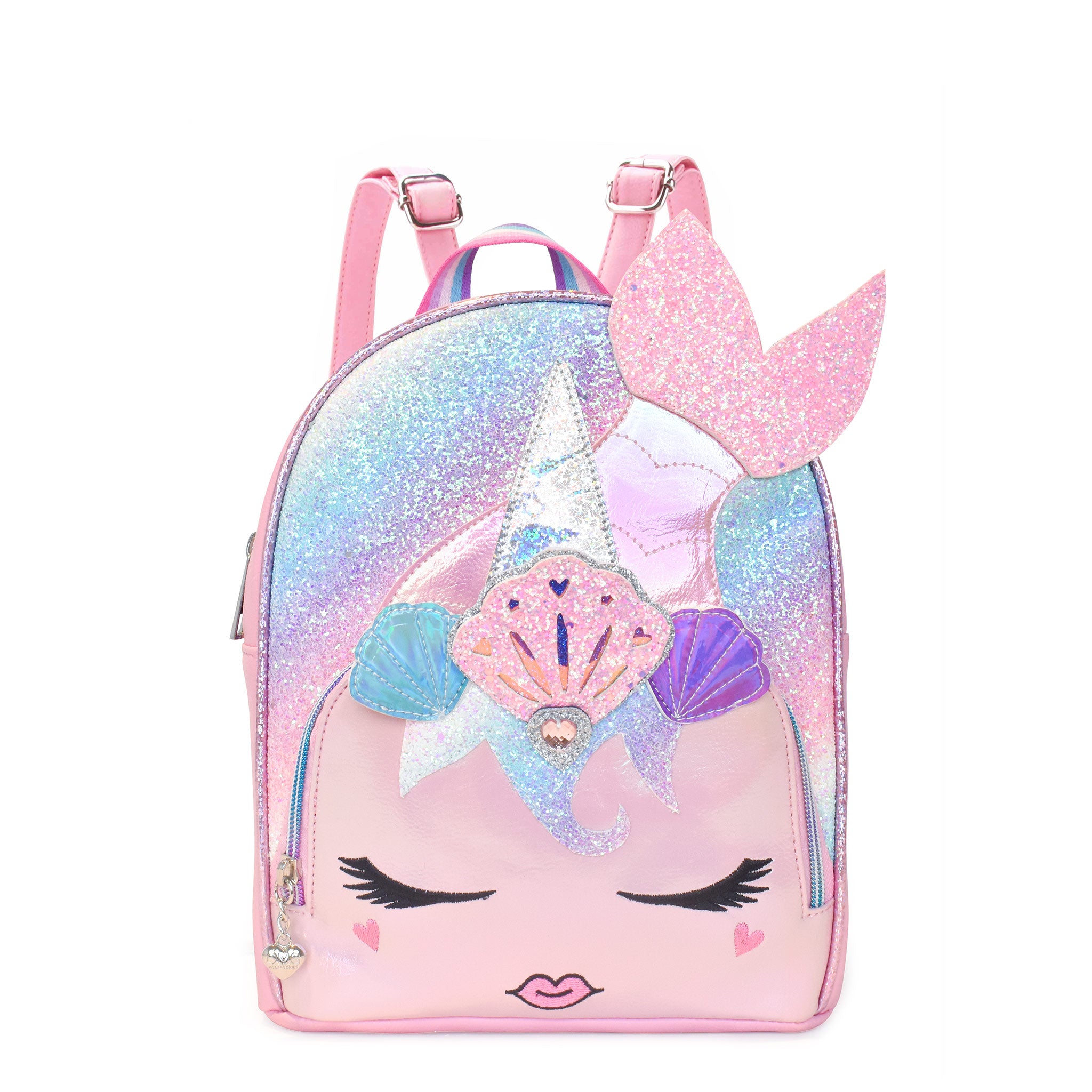Front view of a unicorn mermaid mini backpack in an ombre glitter , embellished with a seashell crown