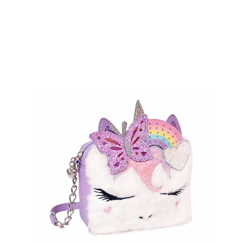 Side view of white plush unicorn face crossbody with glitter butterfly-rainbow crown
