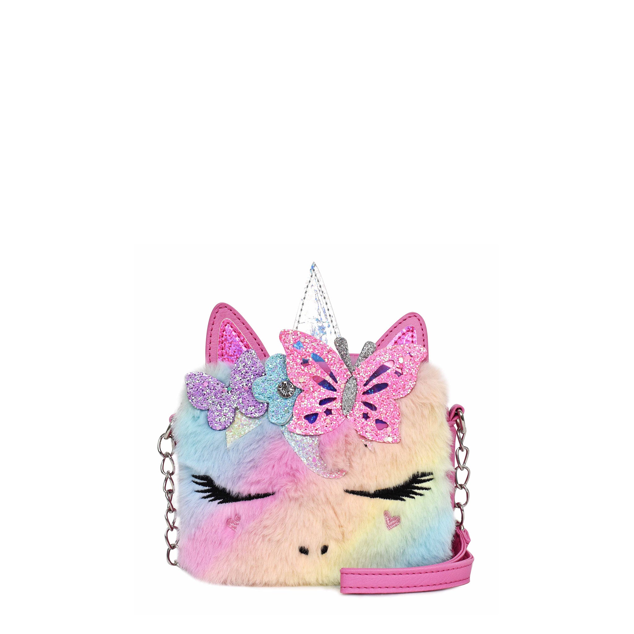 Front view of a rainbow ombre plush unicorn face crossbody with a flower and butterfly crown