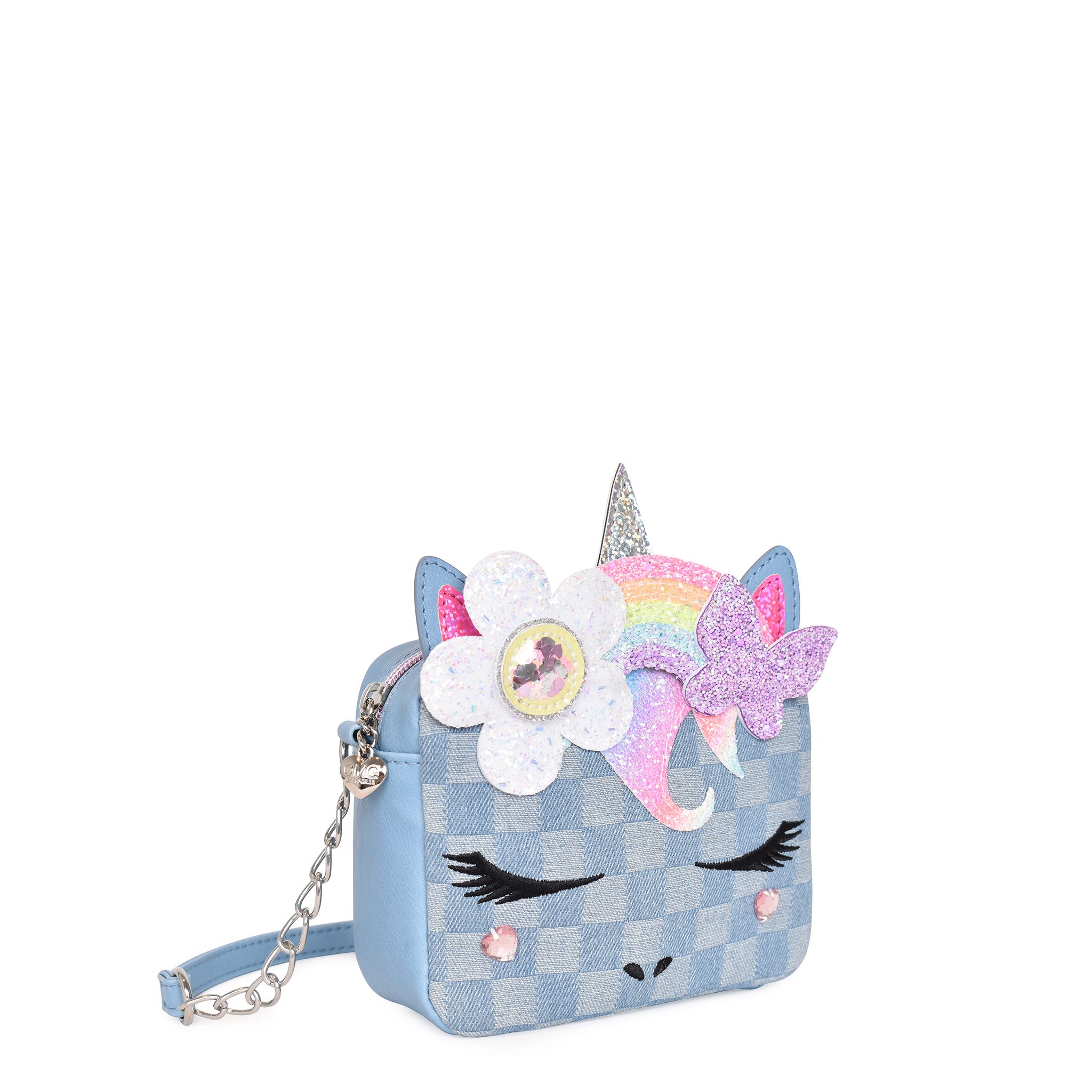 Side  view of a denim checkerboard print unicorn face crossbody with a glitter daisy rainbow crown.
