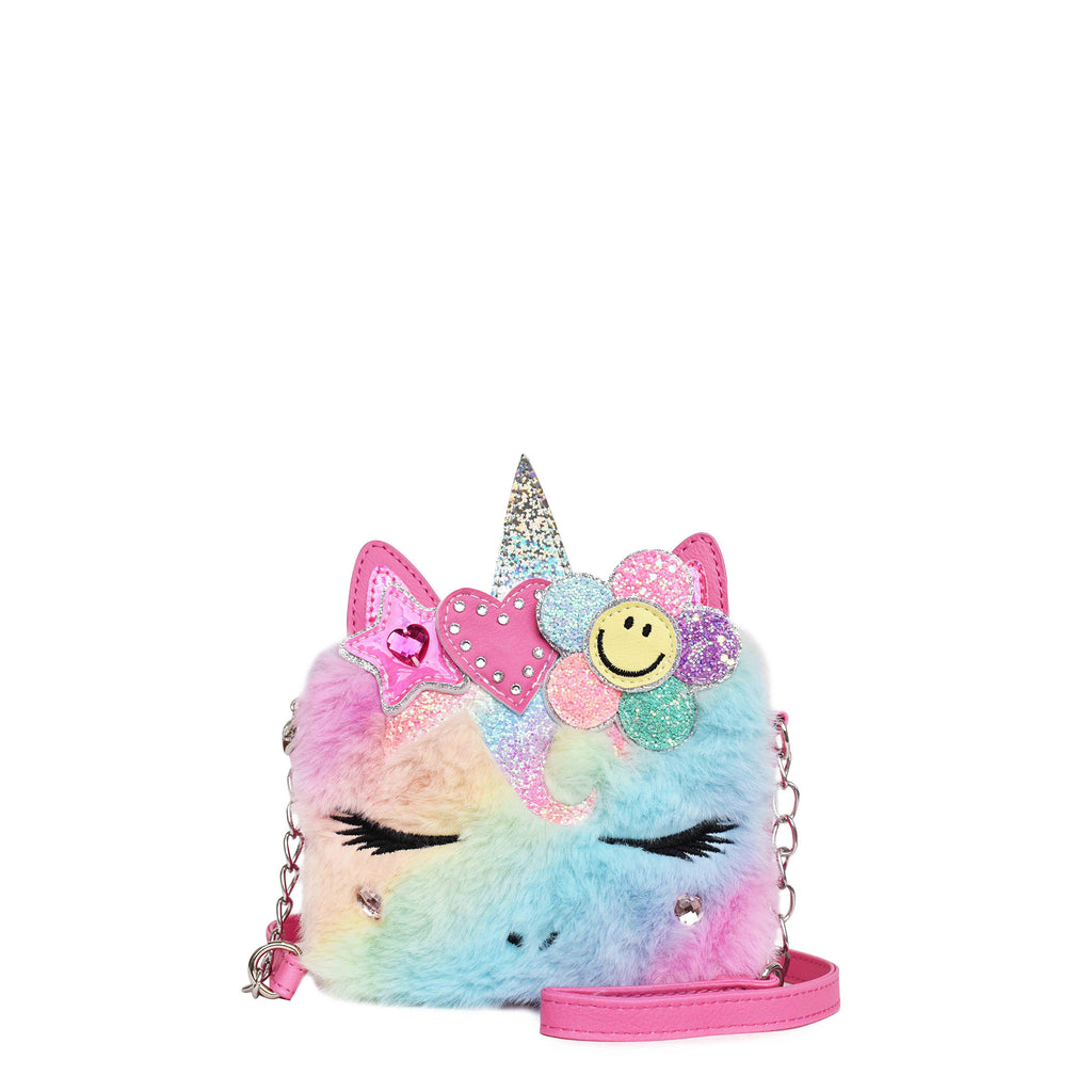 Front view of a rainbow plush unicorn face crossbody embellished with a glitter smiley face, rhinestone heart, and metallic star appliqués 