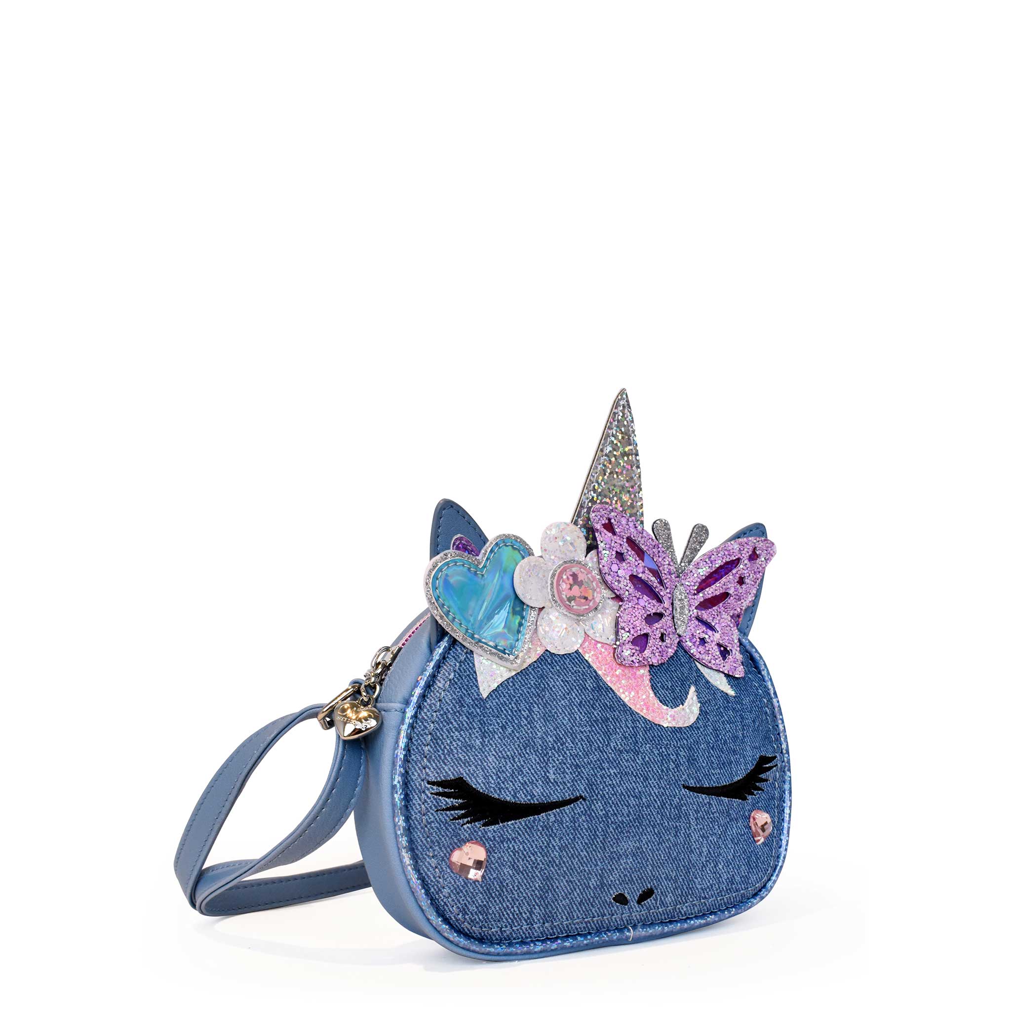 Side View of a Miss Gwen Unicorn Denim Round Crossbody with a appliqué heart, daisy, and butterfly crown
