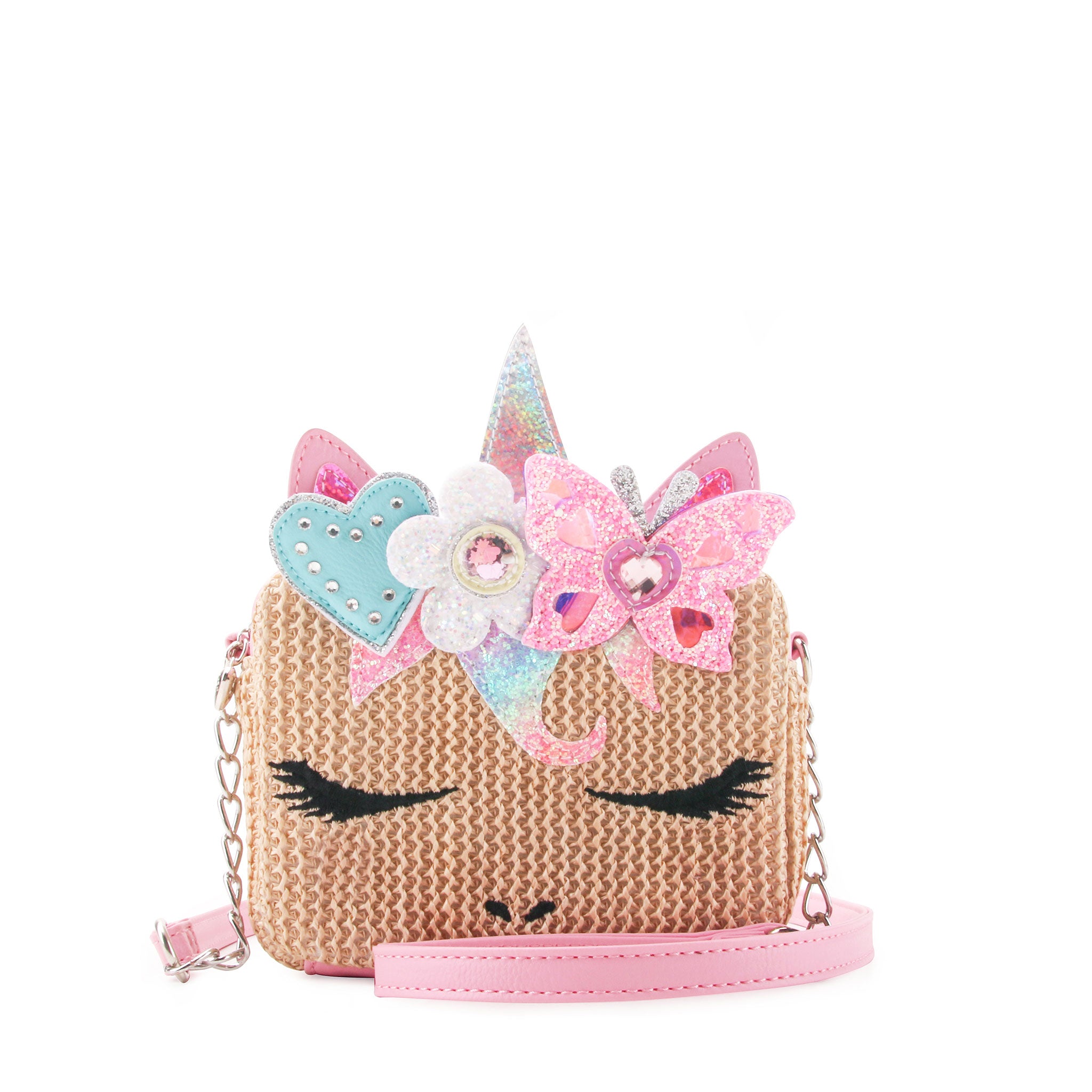 front view of a straw unicorn face crossbody with a glitter butterfly and flower crown