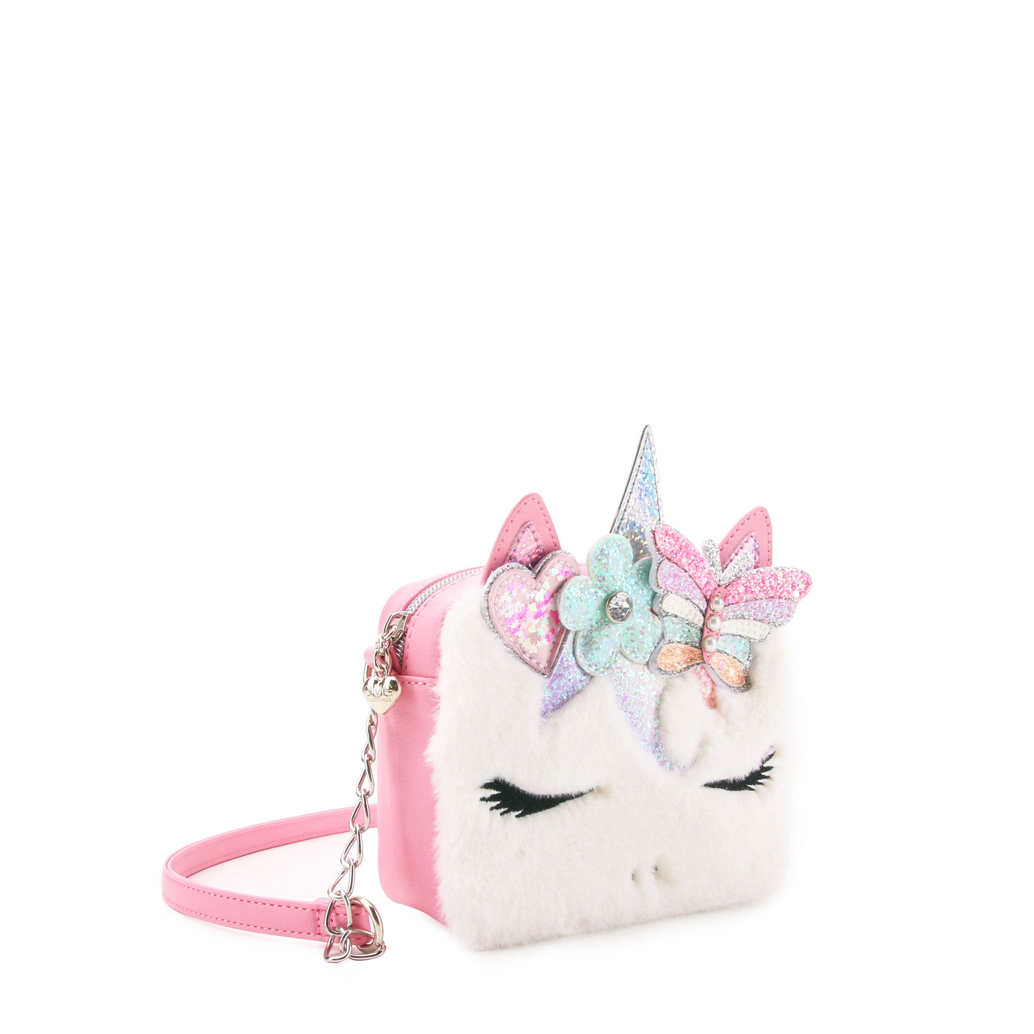 3/4 angle facing view of a white faux fur unicorn mini bag with crossbody strap