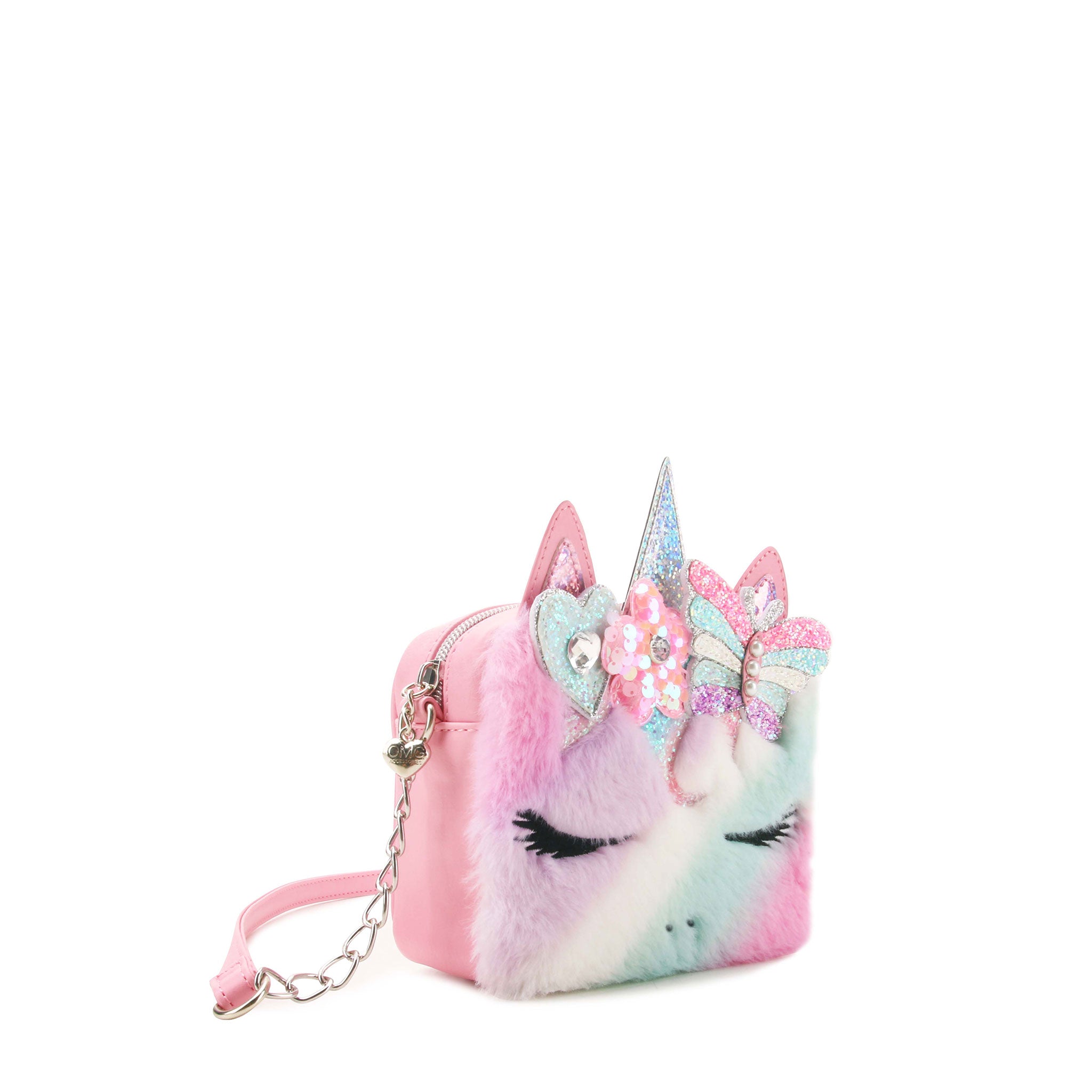 3/4 angle facing view of an ombre faux fur unicorn mini bag with pink crossbody strap