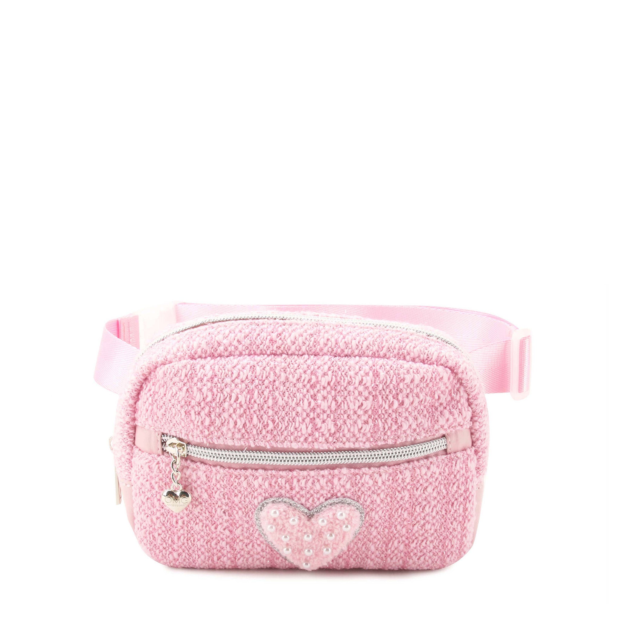 front view of a pink tweed fanny pack with a front zipper pocket and a chenille heart appliqué 