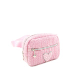 side view of a pink tweed fanny pack with a front zipper pocket and a chenille heart appliqué 