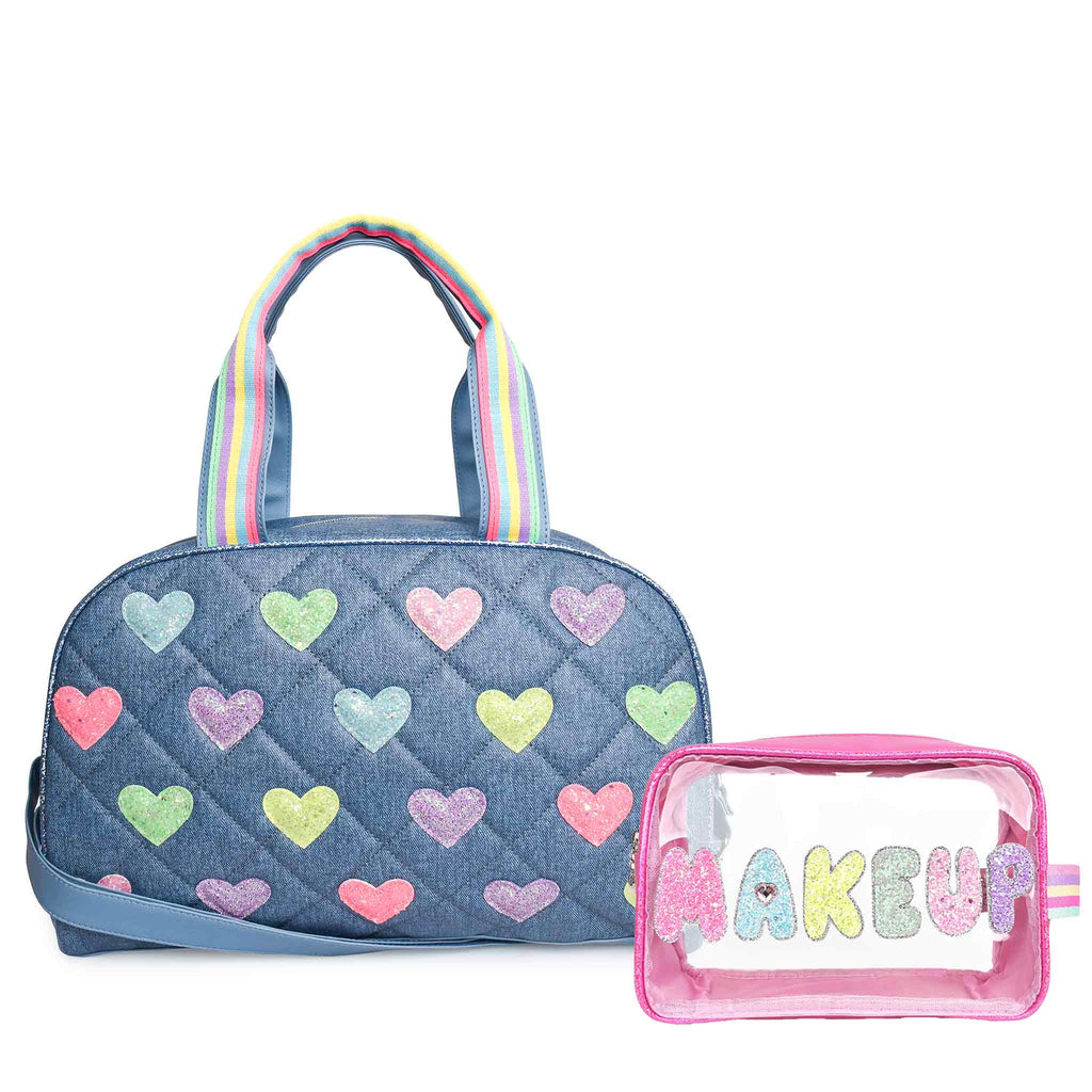 Front view of denim-printed heart-patched duffle bag and clear pink 'Makeup' pouch value pack
