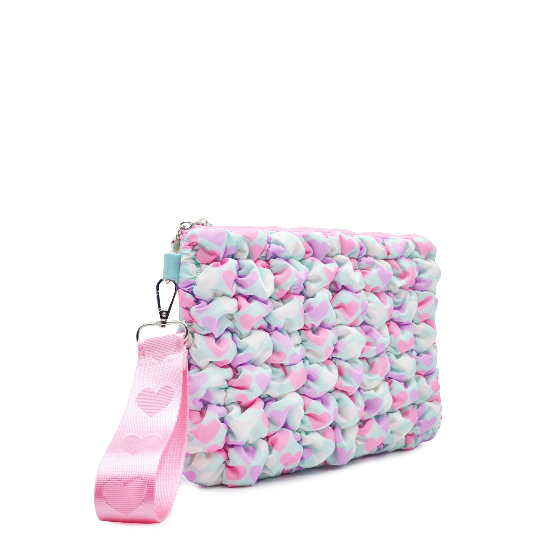  side view of a light blue heart printed zipper pouch with a detachable wristlet 