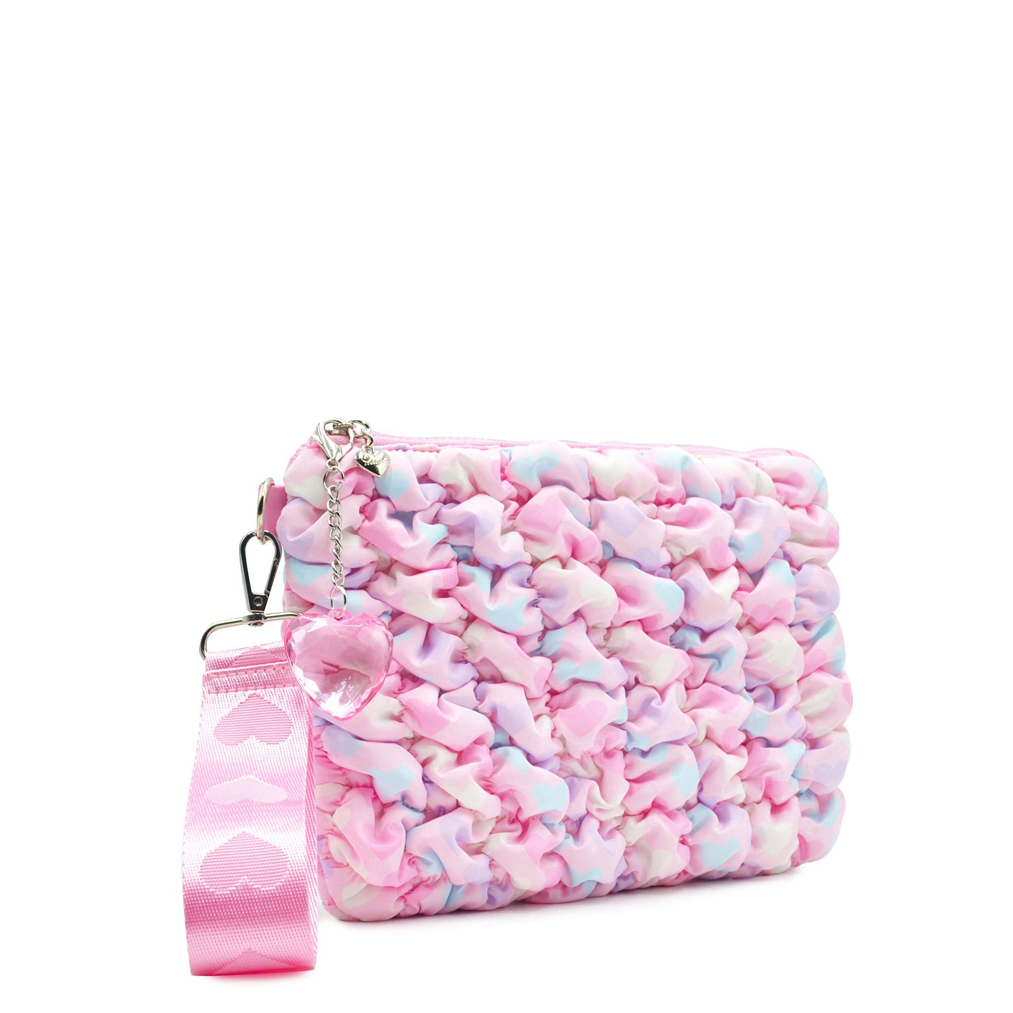 side view of a heart printed pink nylon quilted zipper pouch with detachable wristlet
