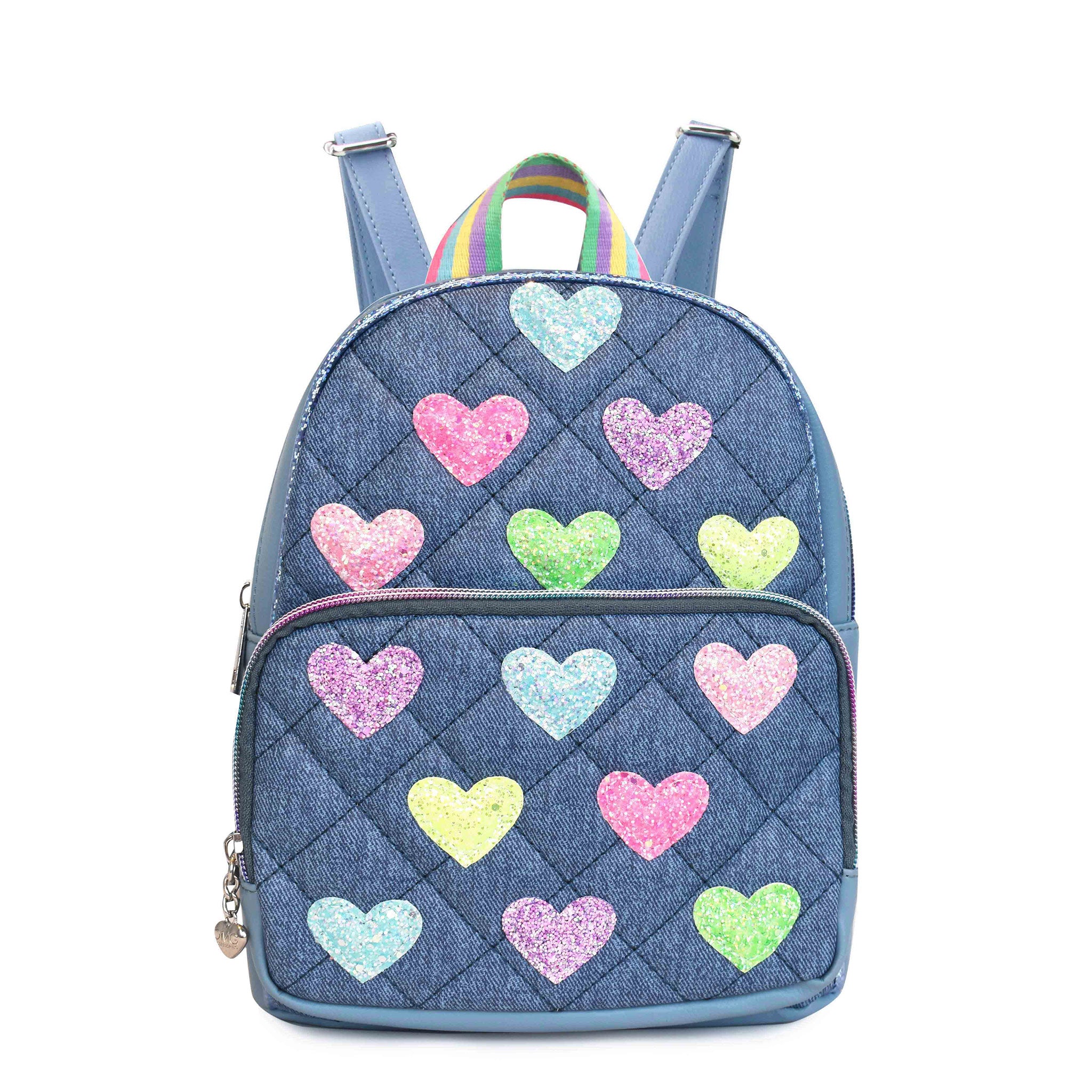 Front view of a quilted denim mini backpack with glitter heart patches 