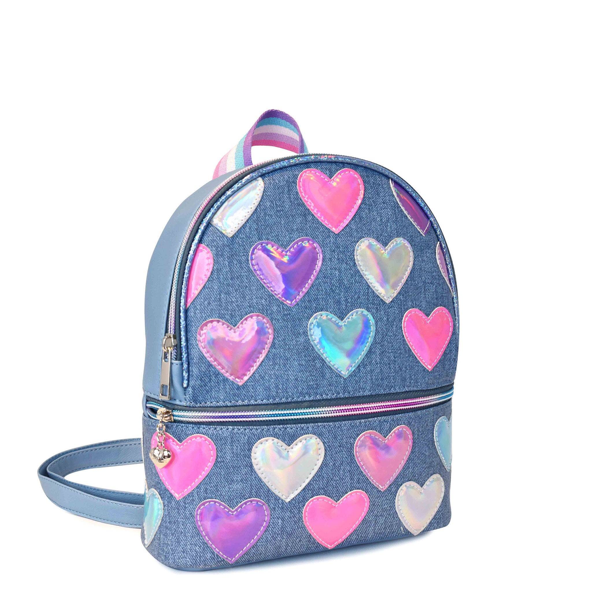 Side view of a denim mini backpack with metallic heart patches