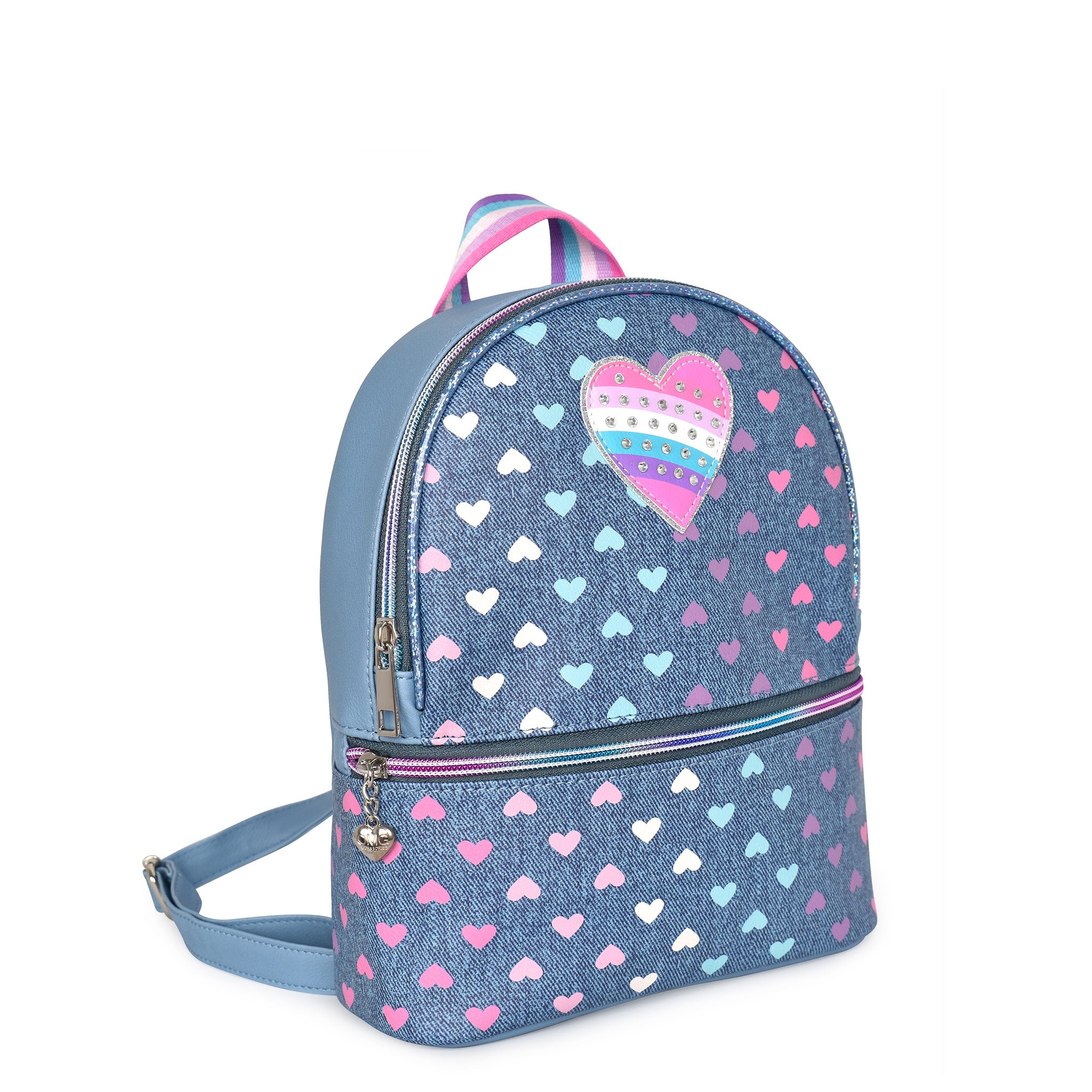 Side view of a denim mini backpack covered in a heart print and embellished with a heart patch appliqué 