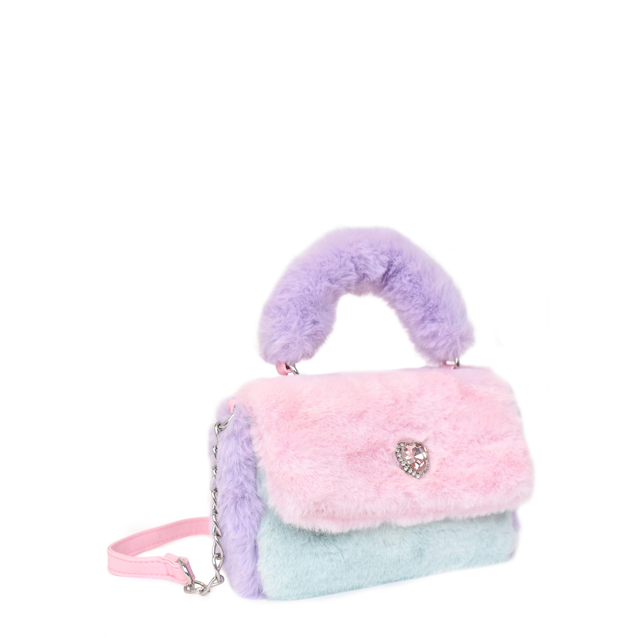 side view of a color blocked mini top handle plush crossbody bag