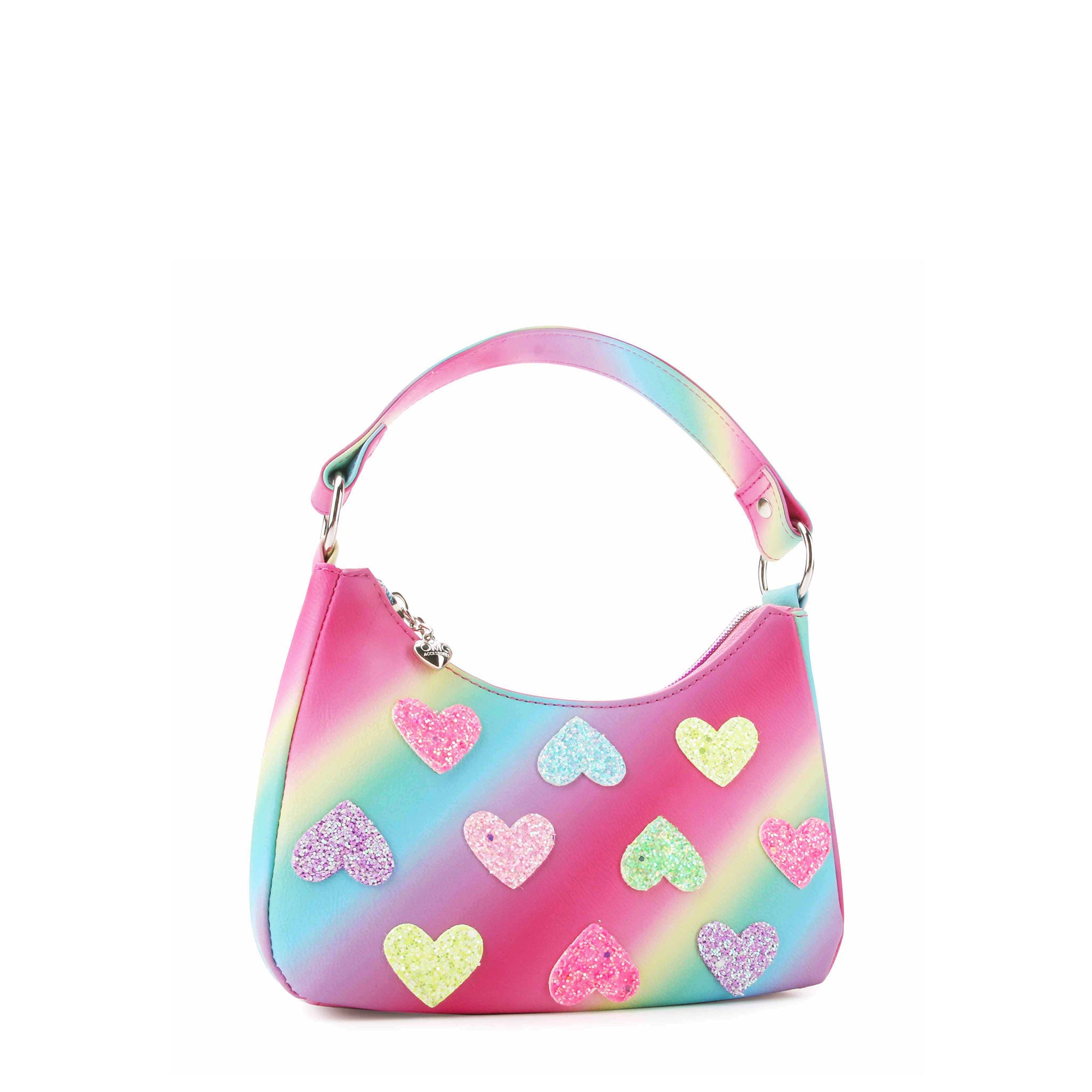 Side view of a rainbow ombre striped mini hobo bag with glitter heart patches