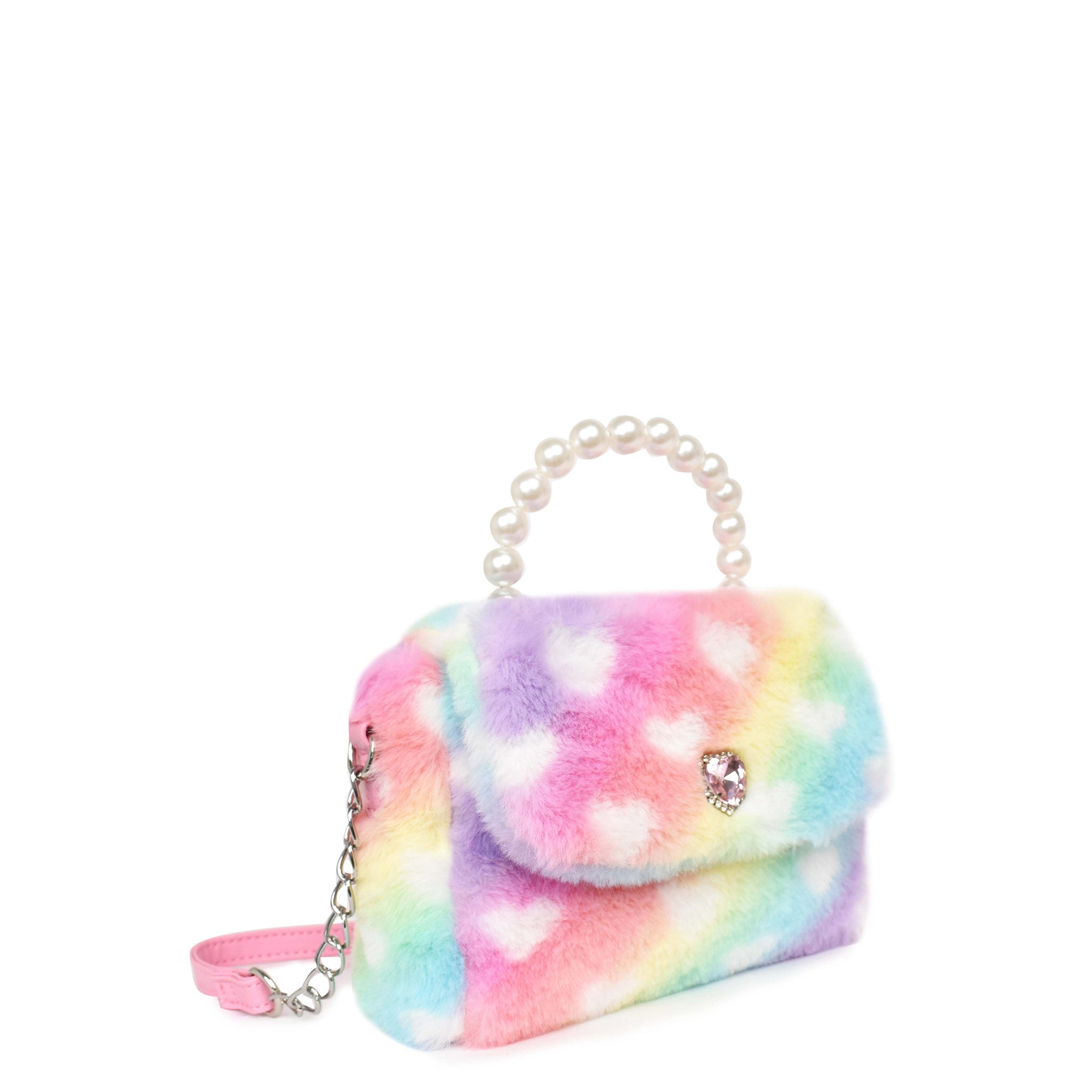 side view of a heart-printed plush flap front crossbody bag with a pearl top handle
