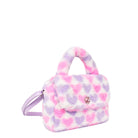 side view of a plush, heart-printed crossbody bag with a rhinestone embellished snap closure
