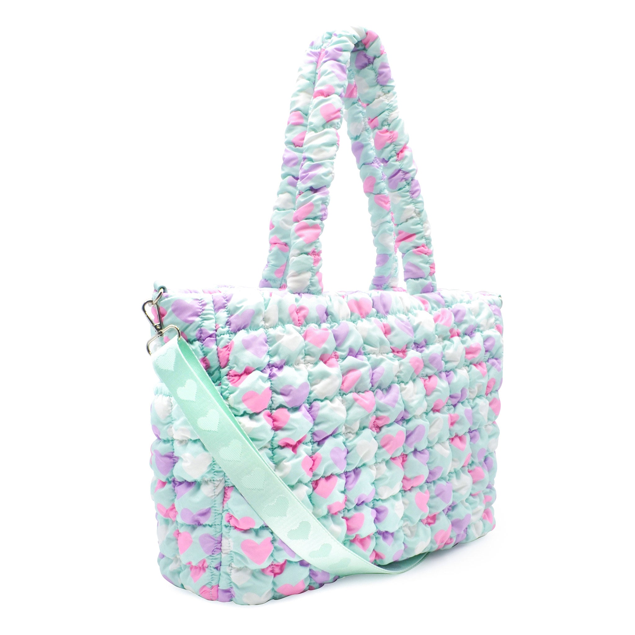 Side View of a Light Aqua Heart Print Nylon quilted large tote bag with removable adjustable straps