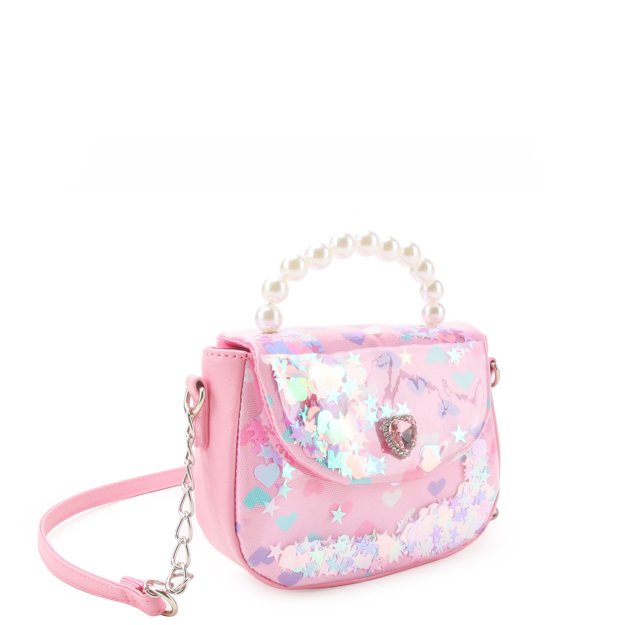 3/4 angle facing view of a vinyl mini bag with a a flap front opening, pearl top handle, printed hearts pattern, and loose confetti detailing