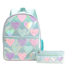 front facing view of a large metallic light blue backpack with heart appliqués and a front zipper pocket, and a light blue metallic pencil pouch with heart appliqués