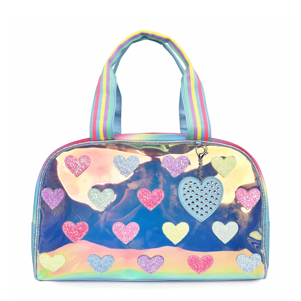 Front view of clear blue glazed medium duffle bag with glitter heart patches and rhinestone heart-shaped keychain
