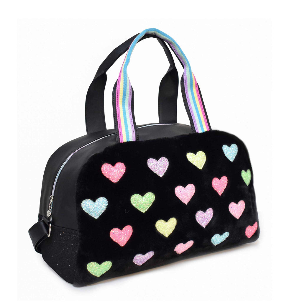 Side view of black plush medium duffle with glitter heart patches