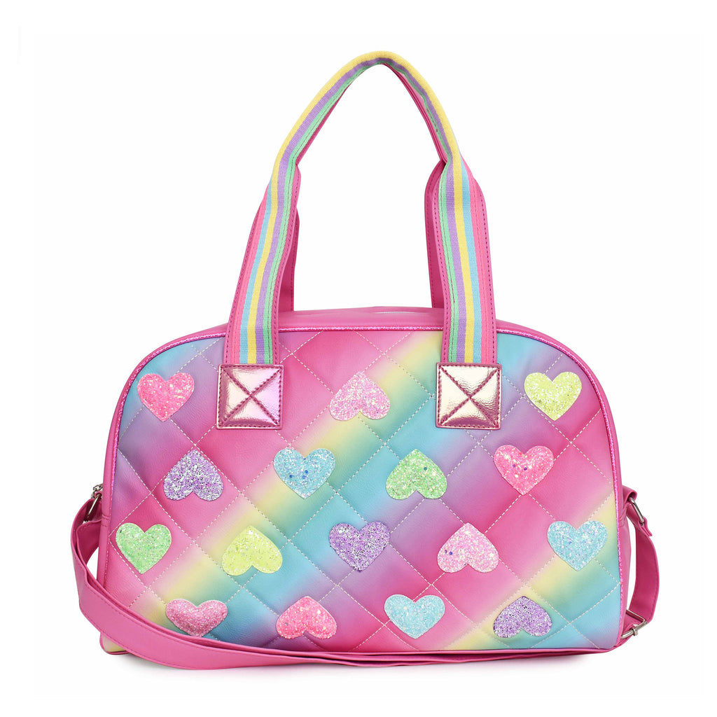 Front view of ombre striped quitled medium duffle bag covered in glitter heart appliqués 