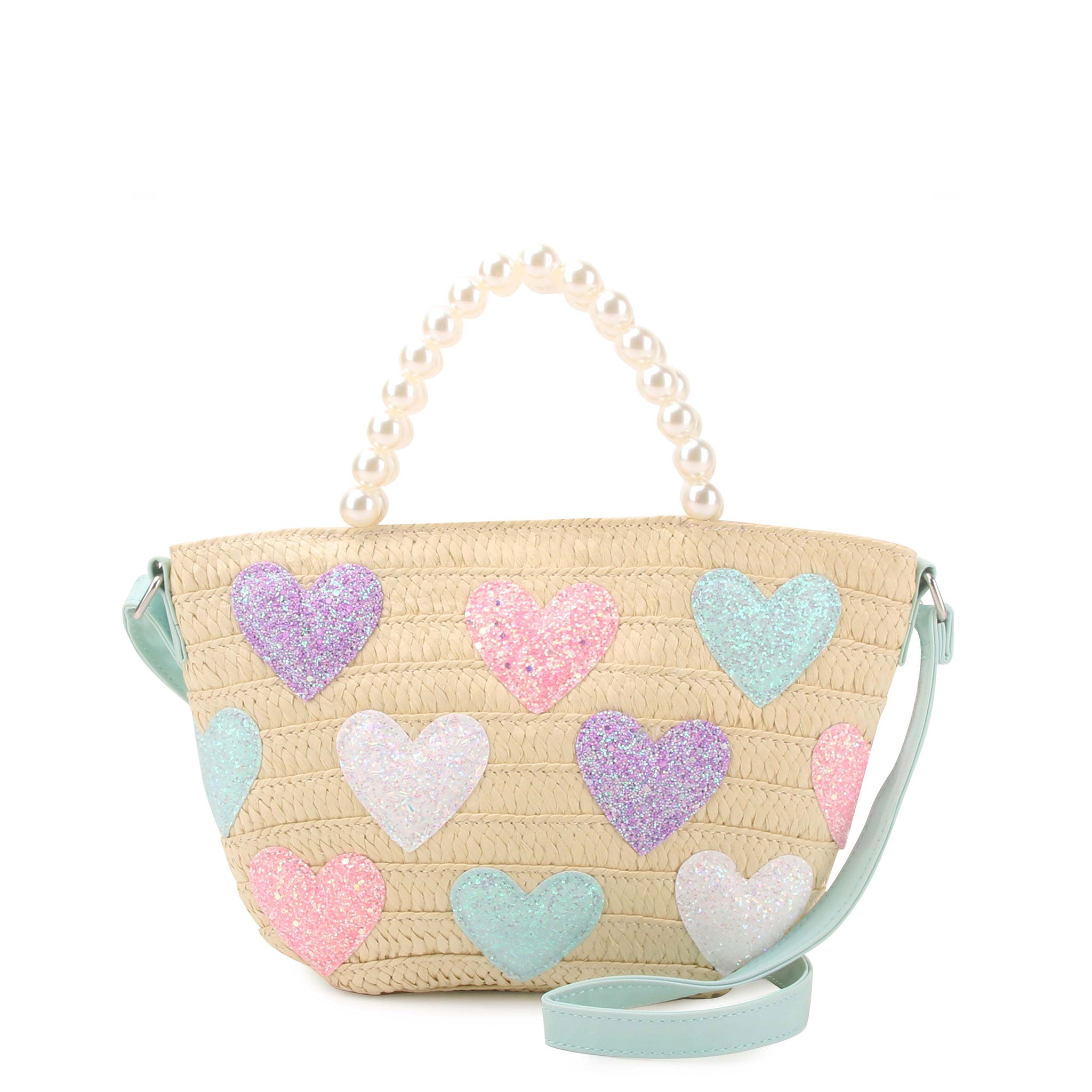 front view of a straw tote bag with glitter heart patches and a pearl beaded top handle