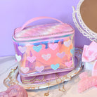 photoshoot photo of a glazed train case with glitter heart patches