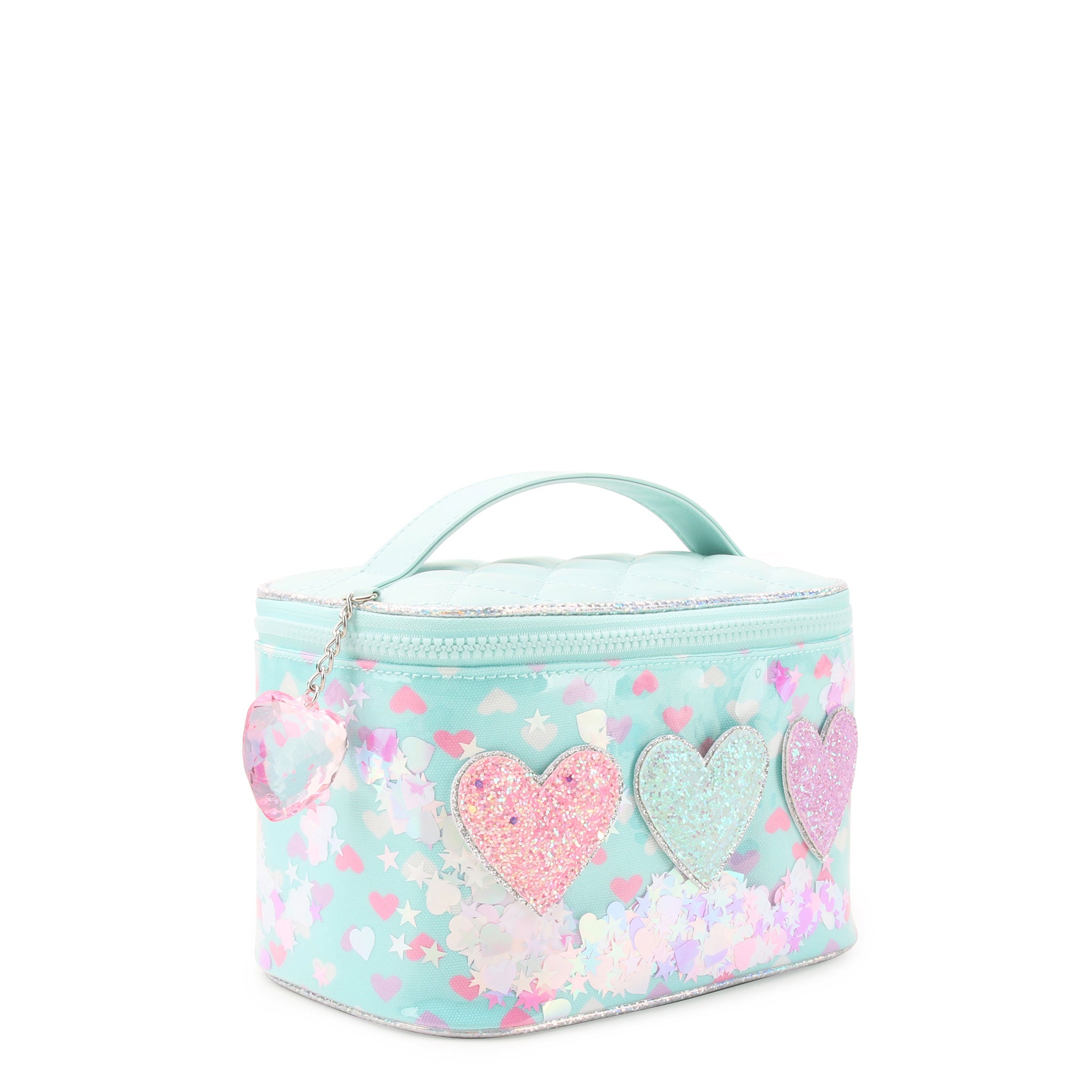 3/4 angle facing view of a light blue vinyl round train case bag with top handle and heart charm. the bag is detailed with printed hearts, loose confetti, and glitter heart appliqués, and a pink crystal heart charm.