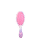 back view of a heart-printed hairbrush with bubble letters 'Love' 