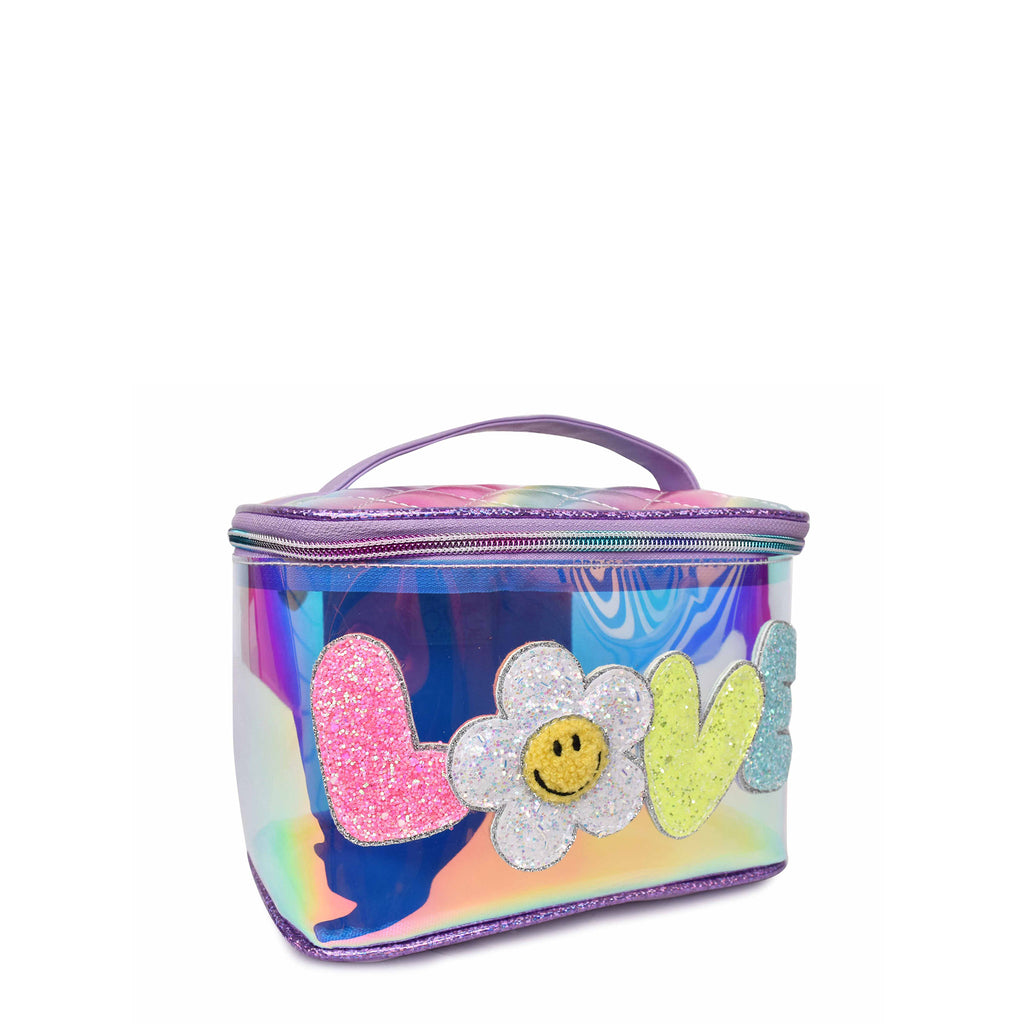 Side view of a purple clear glazed train case with glitter bubble letters 'LOVE' and smiley face daisy patch as letter 'O'.
