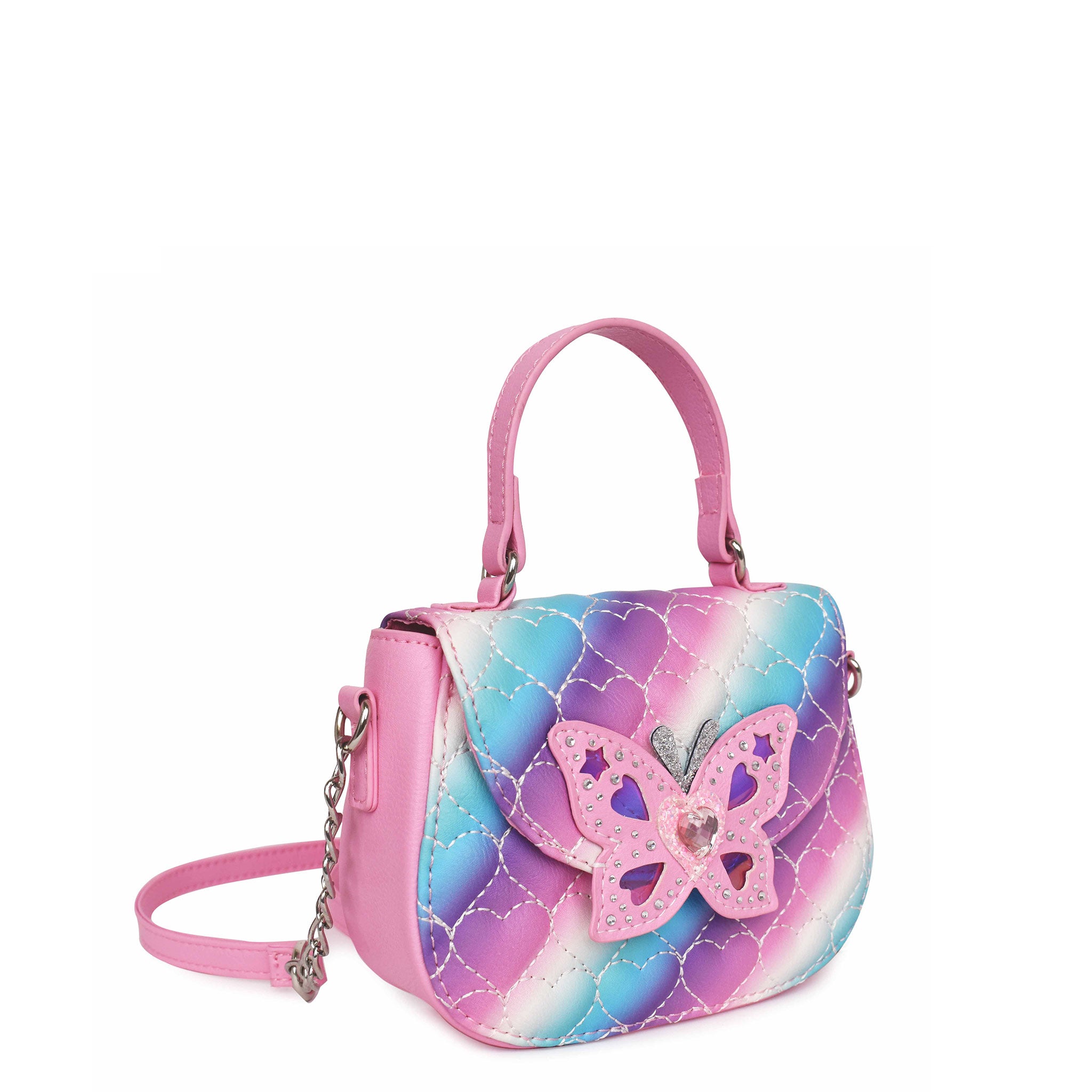 Side  view of an ombre flap front top handle crossbody bag with a rhinestone butterfly appliqué closure button