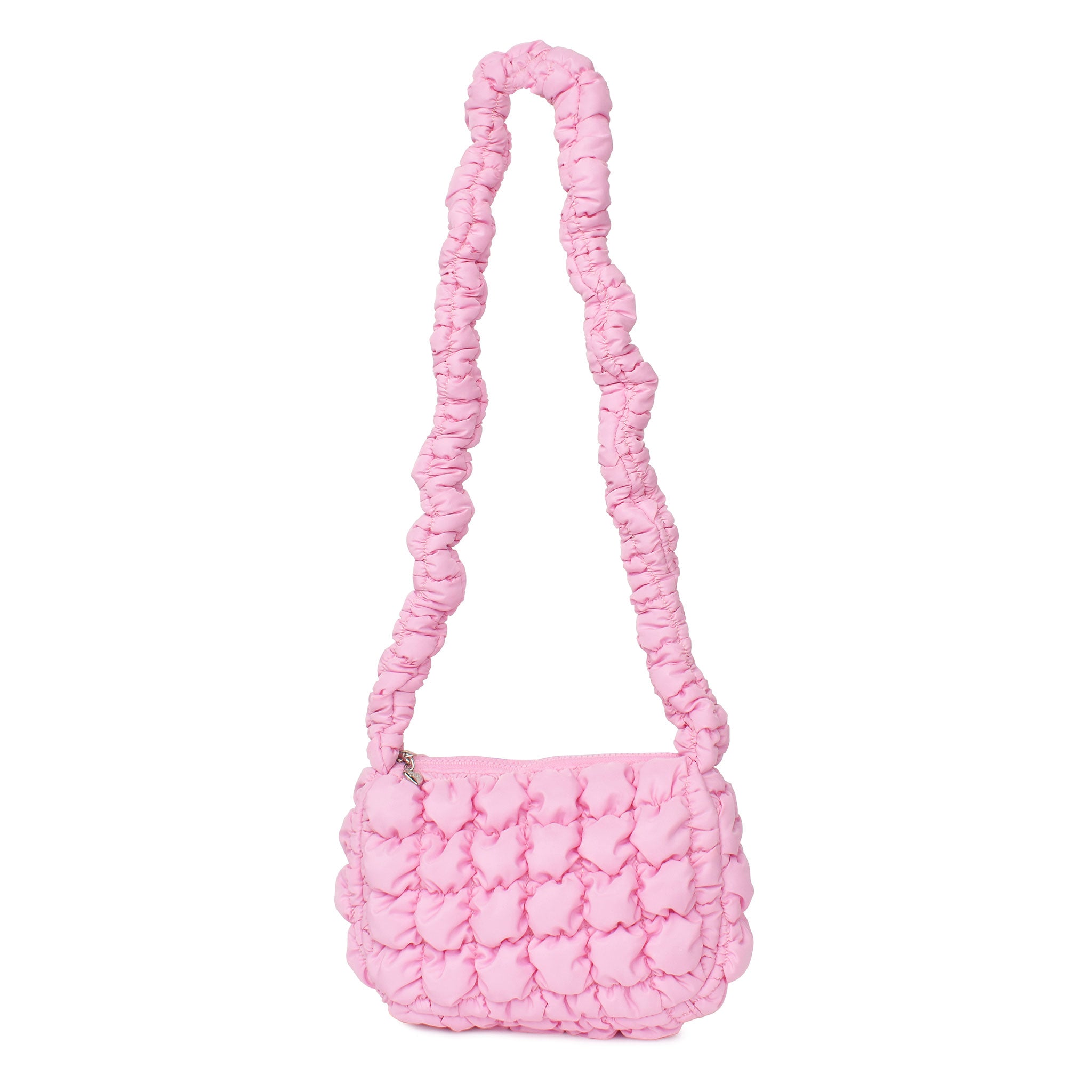 Front view of a long handle scrunch hand bag in a light pink