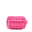 Front view of a hot pink quilted puffer pouch