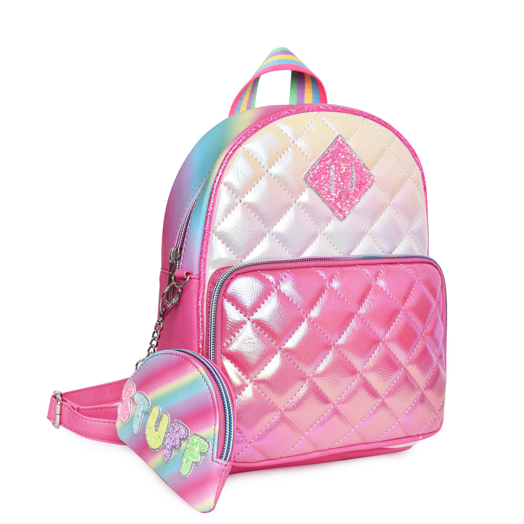 Side view of a metallic quilted pink mini backpack with a rainbow ombre 'STUFF' coin purse keychain