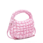 side view of a quilted puffer light pink  mini hobo crossbody bag
