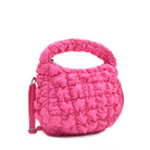 side view of a quilted puffer hot pink mini hobo crossbody bag