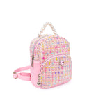 Side view of a tween mini backpack with a heart gem and pearl top handle