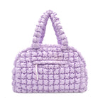 front view of a nylon quilted lavender medium duffle bag 